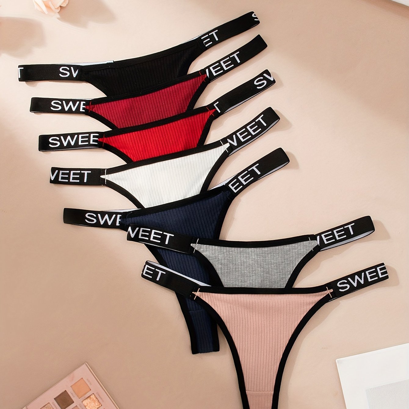 7pcs Letter Tape Contrast Binding Thongs: Sexy, comfortable, and stretchy intimates for women.