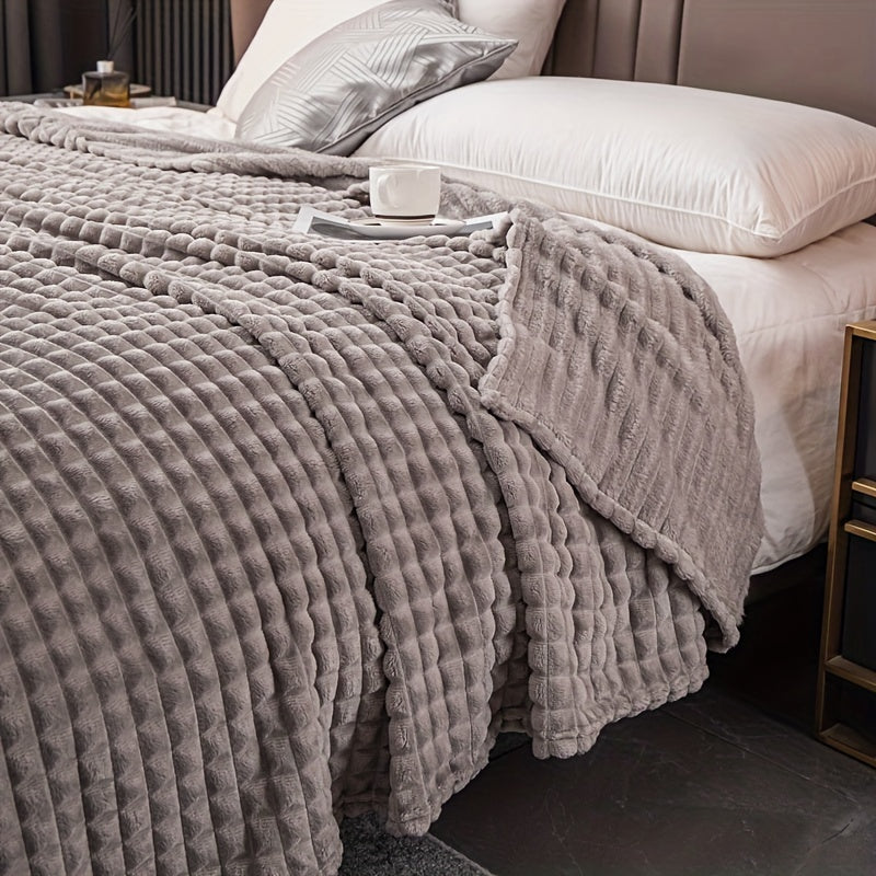 Soft and comfortable waffle plush blanket, made of milk velvet, perfect for use in the bedroom, sofa, office, car, camping, and travel. This multifunctional blanket comes in white, gray, green, brown, and silvery gray solid colors and checkered pattern.