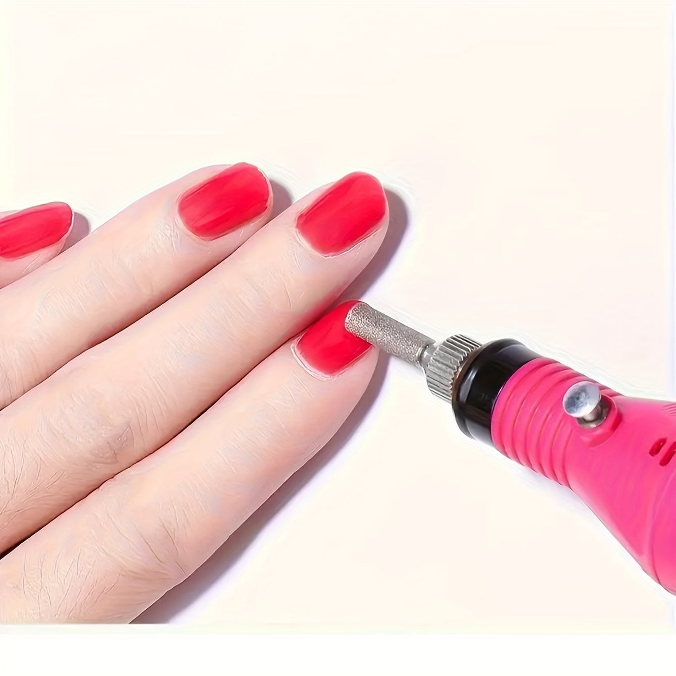 Nail art tool set with USB nail lamp, polisher, cuticle tools, and finger dividers.