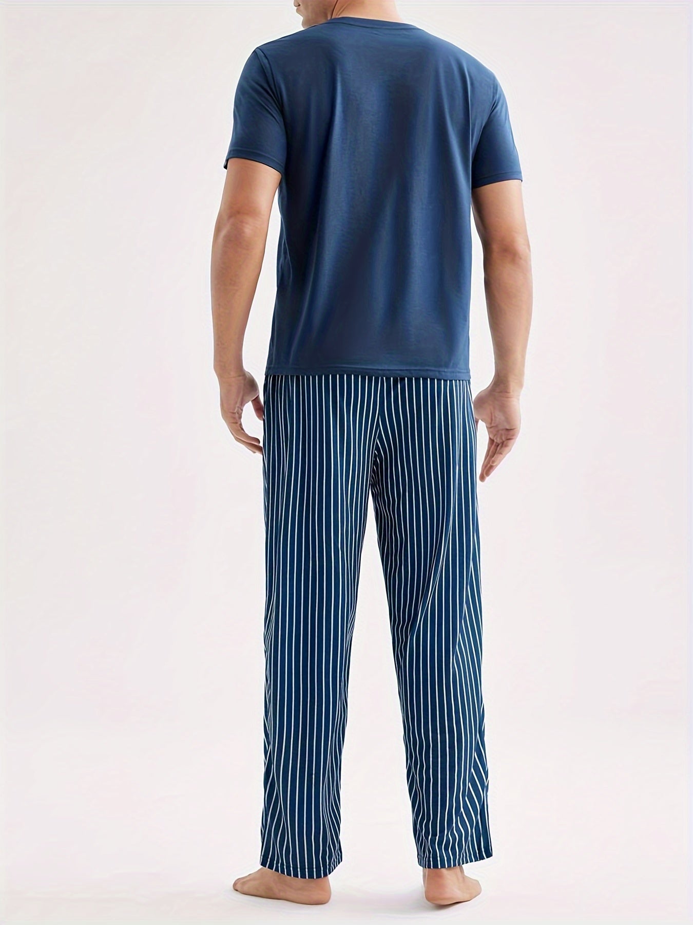 Men's Casual Crew Neck Short Sleeve Pajama Set with Striped Pants, made of 100% Polyester Knit Fabric, with Slight Stretch for All Season Comfort.