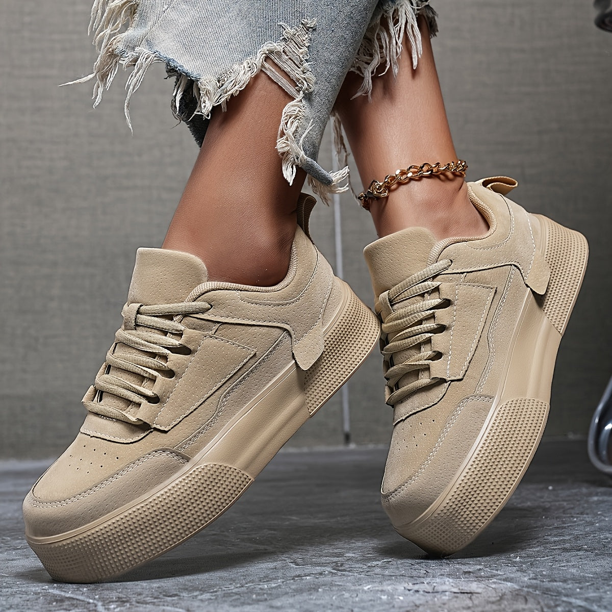 Classic lace-up low top skateboard sneakers for women, with solid color block design and height increase feature. Made with PU upper, fabric inner, and EVA sole for comfort in all seasons.