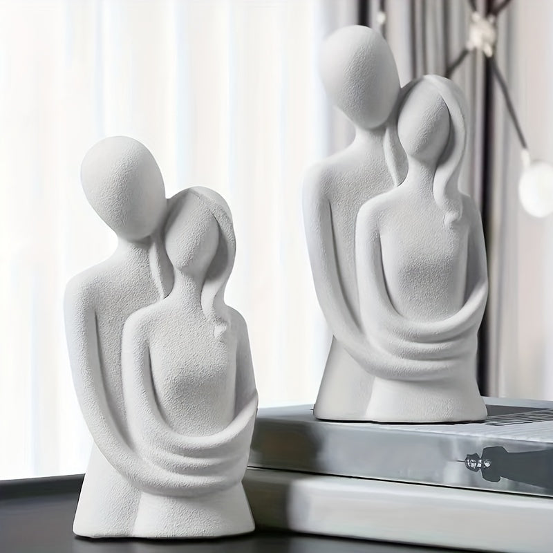 Abstract couple sculpture for indoor/outdoor decor.