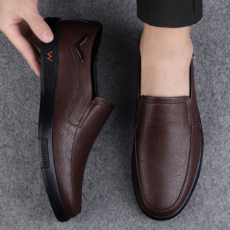 Men's slip on loafers with solid colour upper and comfortable non-slip rubber sole.