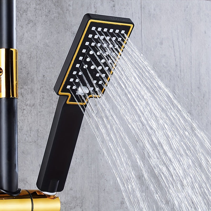 Modern black and gold bathroom shower system with rain showerhead, handheld, tub faucet, and hot/cold water mixer. Made of luxurious brass.