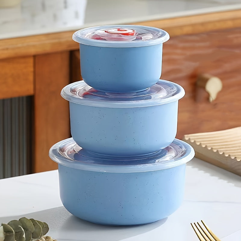 Set of three food storage containers made from wheat straw material, featuring flip top lids. Versatile, eco-friendly, hand wash recommended, microwave-safe, round bowls with sealable lids for preserving food.