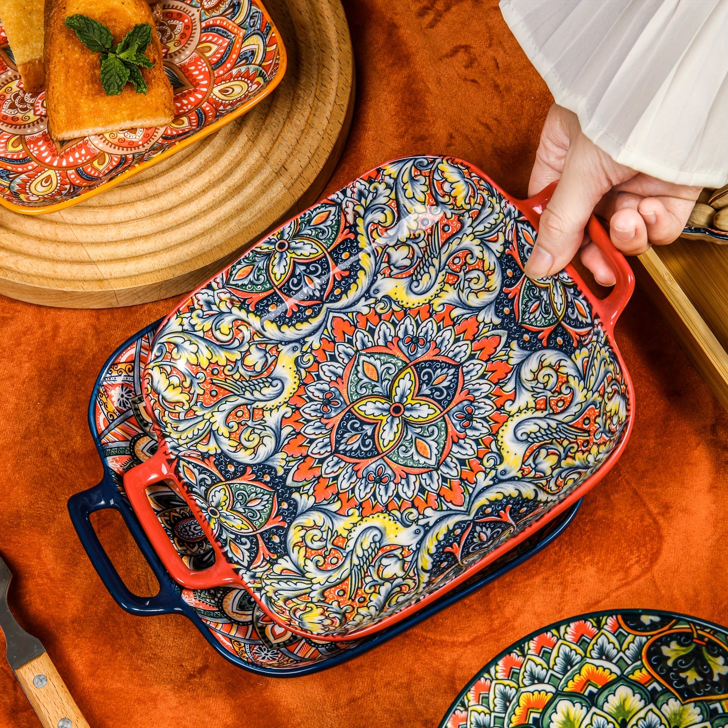 Square ceramic serving tray with floral design and double handles, perfect for any season.