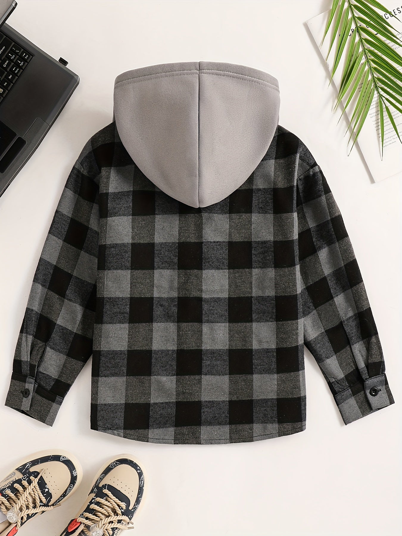 Boys' plaid hooded shirt in blue and black with flap pockets, made of cozy polyester for fall/winter casual wear.