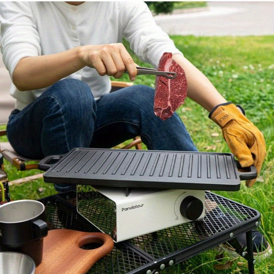 Large rectangular non-stick cast iron cookware with handles, featuring a reversible pre-seasoned grill and griddle combo, perfect for cooking and baking.