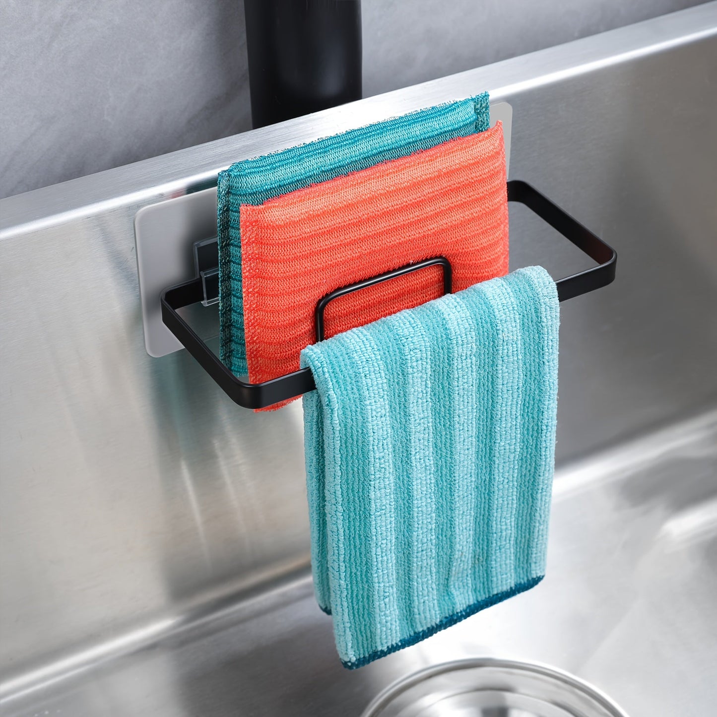 A versatile, durable cleaning tool storage rack made of plastic, featuring sponge racks. This space-saving rack is easy to install and suitable for kitchens, bathrooms, and general household storage needs. It is multifunctional and designed to store