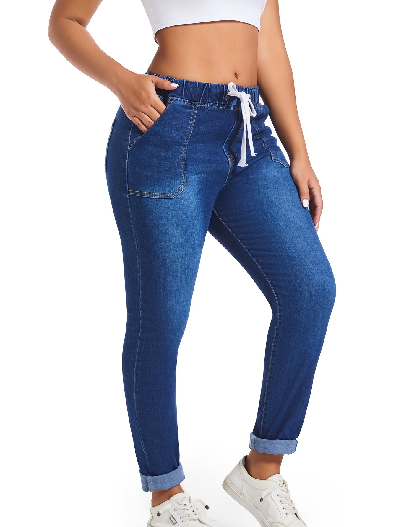 Vintage style women's plus size skinny jeans with drawstring waist, made of 49% polyester and 3.0% spandex denim.