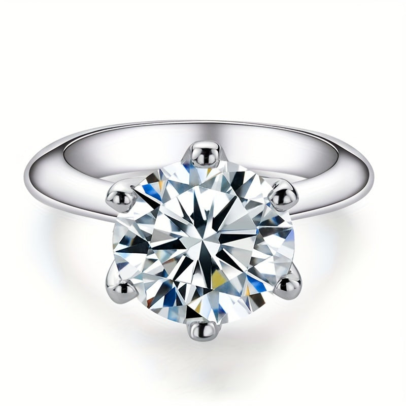 This stunning Classic Six-Prong Moissanite Promise Ring is available in 1, 2, 3, or 5 carat options. Crafted from 925 sterling silver and plated with 18k gold, this high-quality jewelry piece is perfect for engagements or marriages. It is a truly special