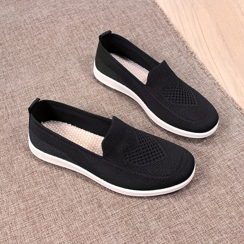 Women's slip-on flats with comfortable fabric upper, flax insole, and faux sole for easy daily wear.