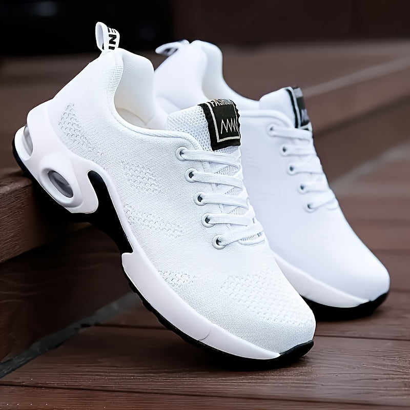 White running shoes for women with breathable knit material, air cushion sole, and shock-absorbing platform design.