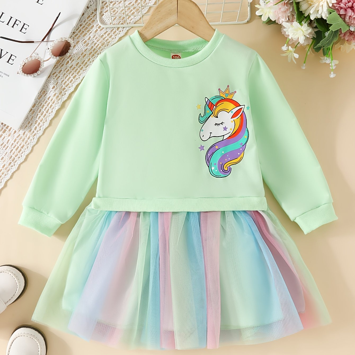 Rainbow tutu dress with unicorn print for girls, perfect for parties or vacations in spring or autumn.