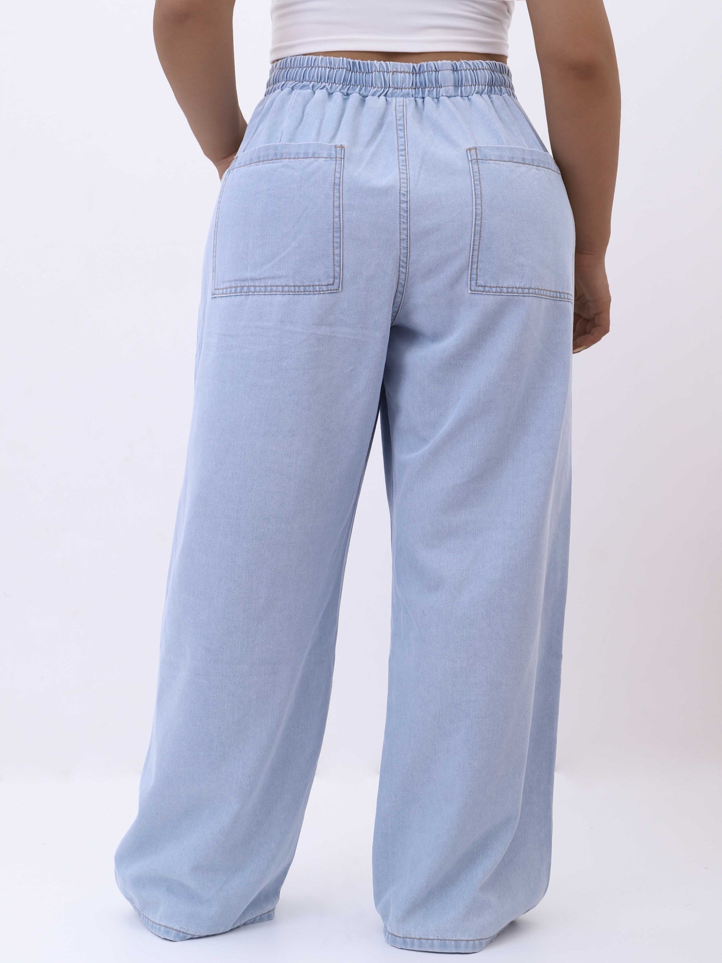 Women's plus size wide-leg jeans with high rise, drawstring waist, solid color denim for spring/fall.