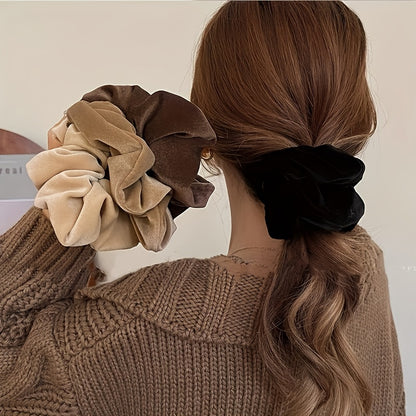 Velvet Scrunchies set of 4 in beige, brown & black, for comfortable and stylish hairstyles.