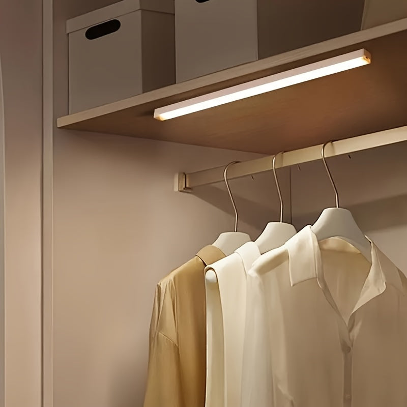 Rechargeable motion sensor cabinet light with magnetic wall-mount, push-button control, USB powered, adjustable lighting, and 150mAh lithium battery.