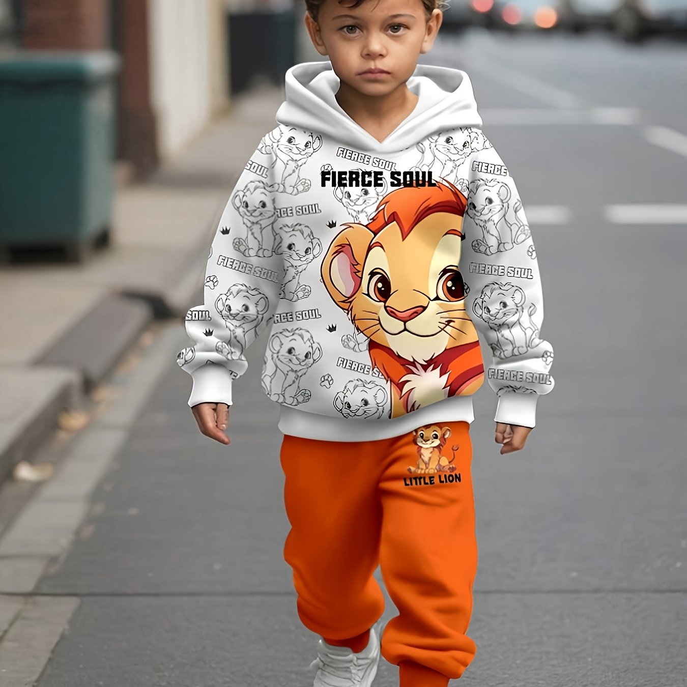 Trendy boys' lion print hoodie and sweatpants set for fall/winter, ideal for outdoor play.