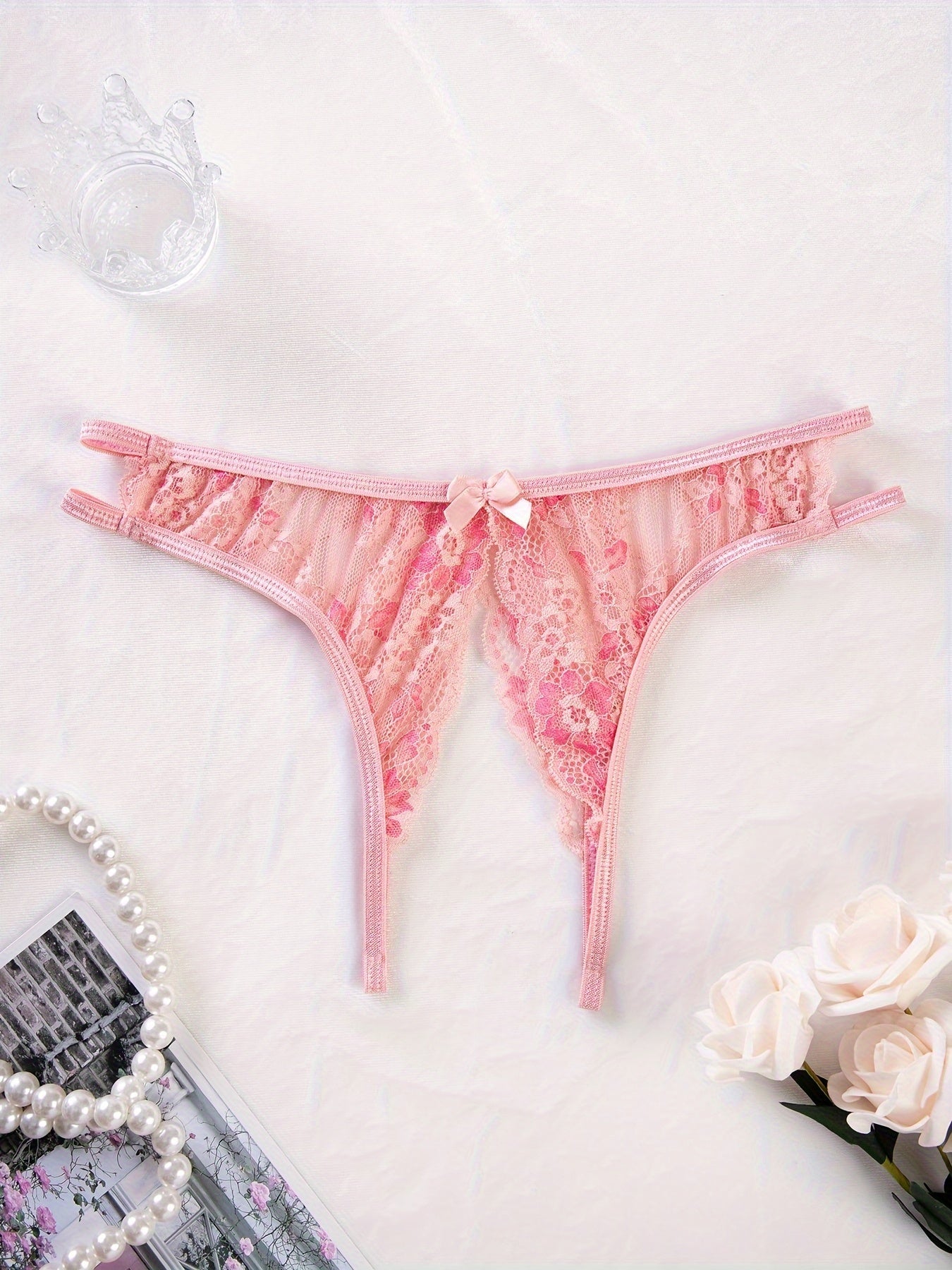 Stylish floral lace panties featuring bow detail, semi-sheer, comfortable fit for plus size women. Cute and fashionable.