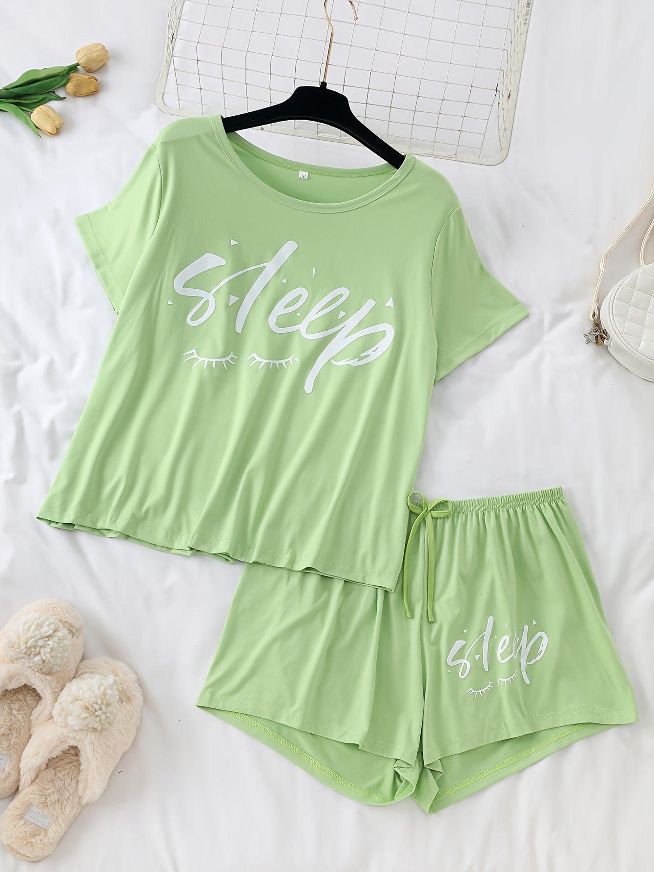 Women's 3-piece pajama set featuring alphabet print, polyester knit fabric with stretch, color block short sleeve top and shorts. Perfect for fall season lounging at home.