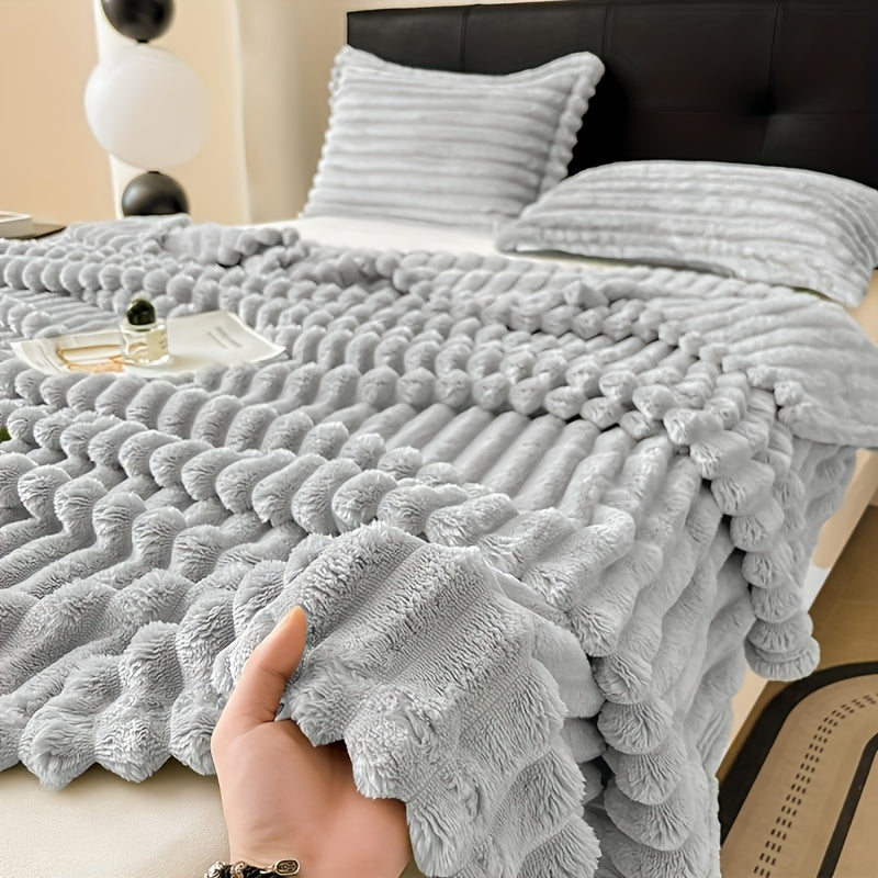 Machine washable, this luxurious double-sided throw blanket is made of faux rabbit fur that is warm, soft, and cozy. Perfect for naps, office use, outdoor camping, or on the sofa. The soft striped design adds a touch of elegance, making it a perfect gift