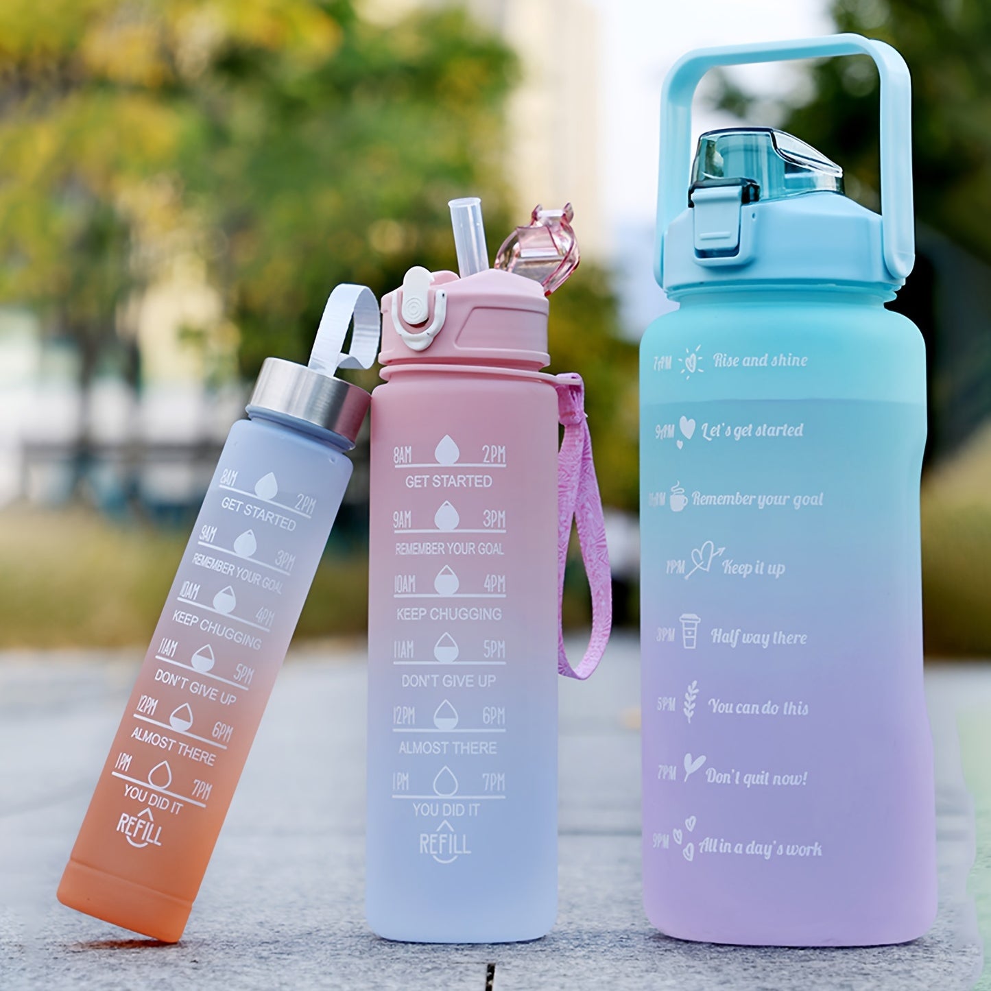 Set of 3 gradient sports water bottles in different sizes with straw, made of scratch-resistant frosted plastic, ideal for fitness and outdoor activities.