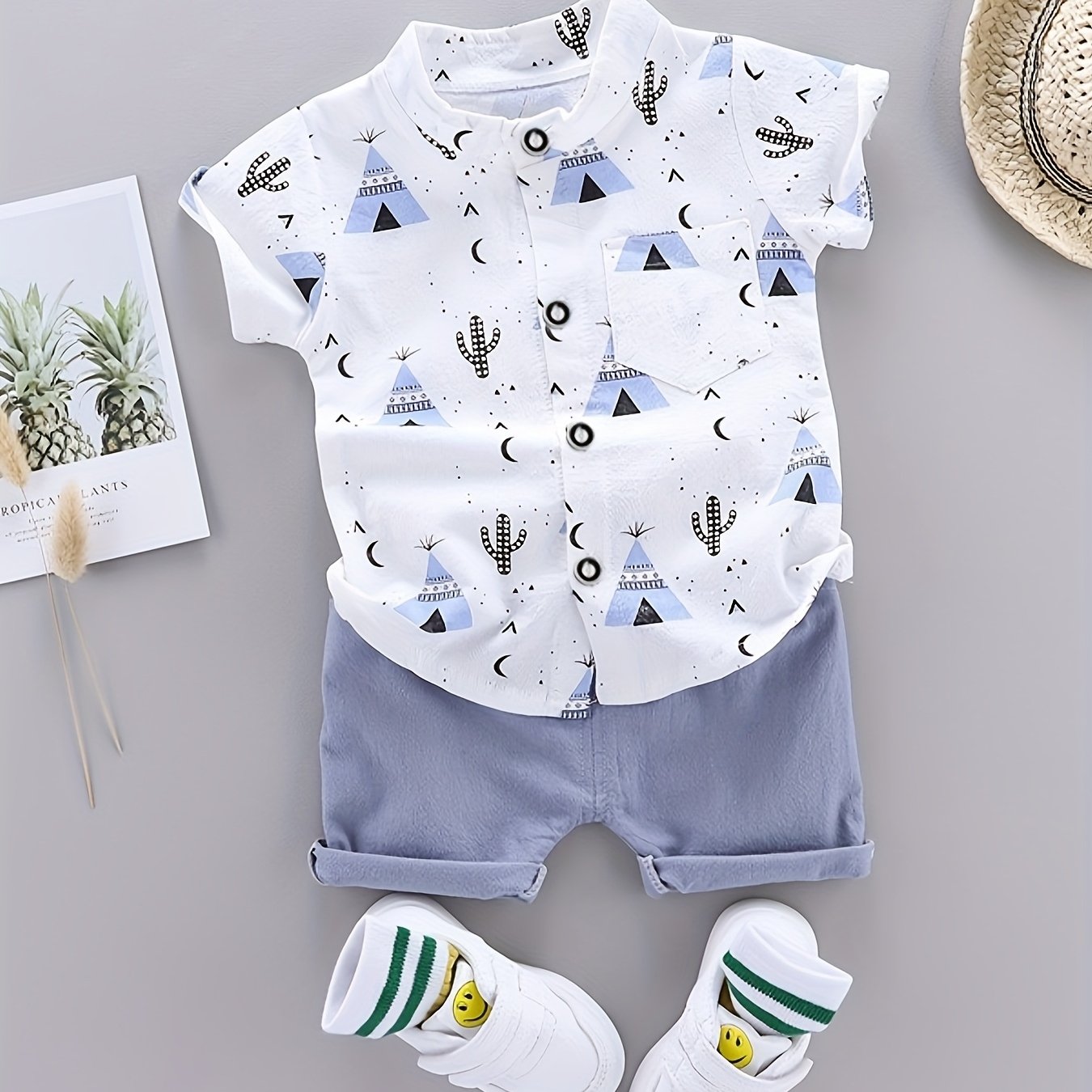 Boys' casual gentleman set with pyramid print, including standing collar button-up shirt and shorts. Comfortable and loose fit for outdoor activities.