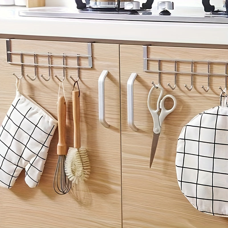 This Stainless Steel Hook Rack features 5 hooks, perfect for hanging behind doors, on cabinet doors, or on walls. Made of durable stainless steel, it is versatile and can be used for hanging towels behind living room doors or clothes in bedrooms. It is