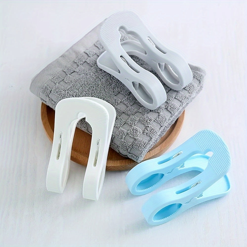 Half Pack of Multifunctional Double Clip Clothespins made with Non-Slip Windproof Polypropylene, ideal for attaching Quilts. Recommended for Hand Washing Only. Perfect for Towels and Clothes Drying on Sunbeds or Loungers. Available in White, Grey, and