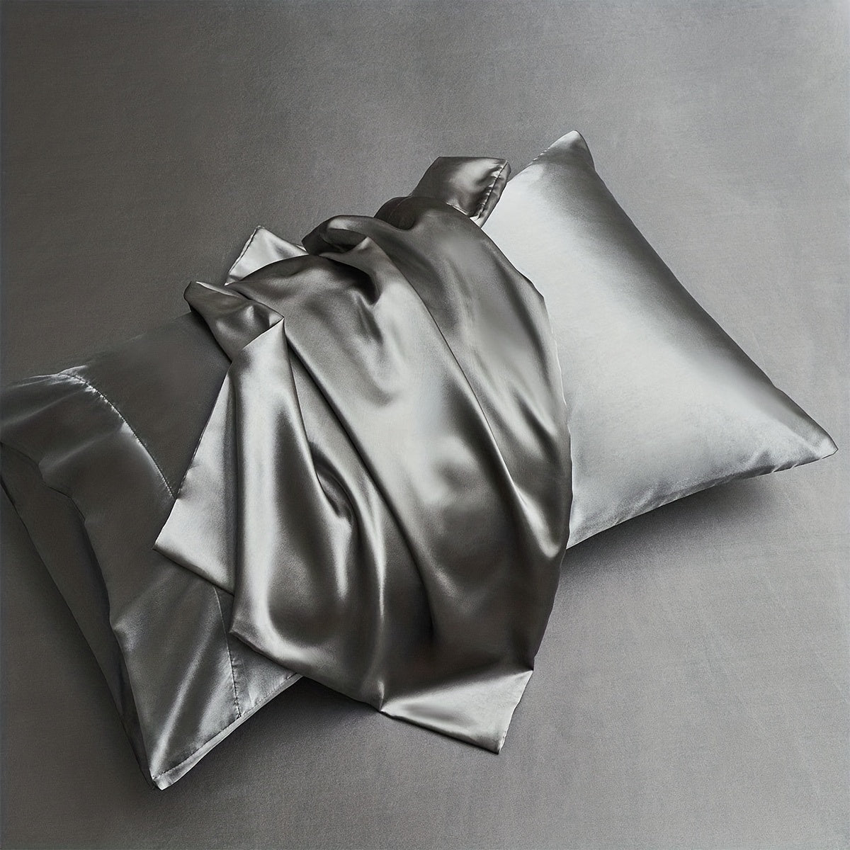 Two pieces of satin pillowcases available in solid colors perfect for the living room or bedroom. Pillow inserts are not included.