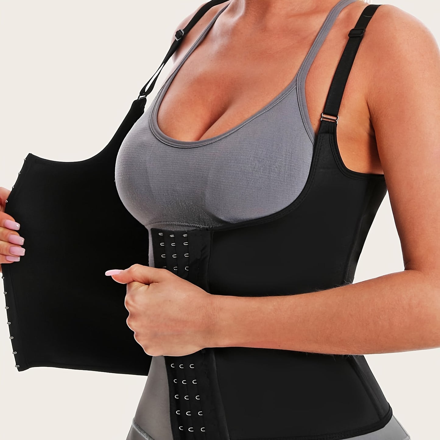 Breathable waist training vest with shoulder strap buckle.