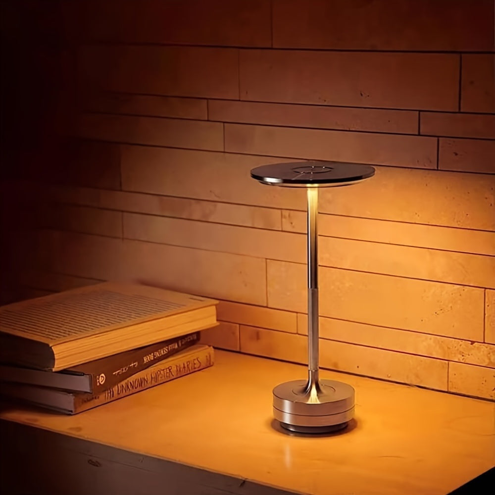 Battery-powered, wireless bedside lamp with 3-color dimming options. LED lamp available in black, golden, or silvery for various rooms.