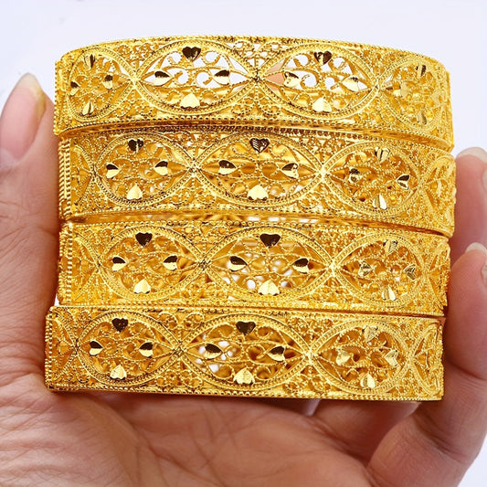 A pack of 4 Dubai bracelets in popular Middle Eastern style, plated with 24k gold. These fashion-forward and versatile bracelets are perfect for weddings or everyday wear. The set includes a classic hollow ring surrounded by love-themed designs, creating