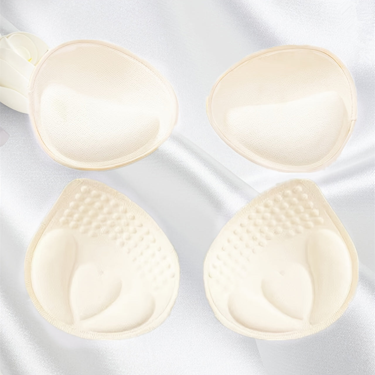 Replaceable inner sponge push up pads for women's lingerie and underwear accessories.