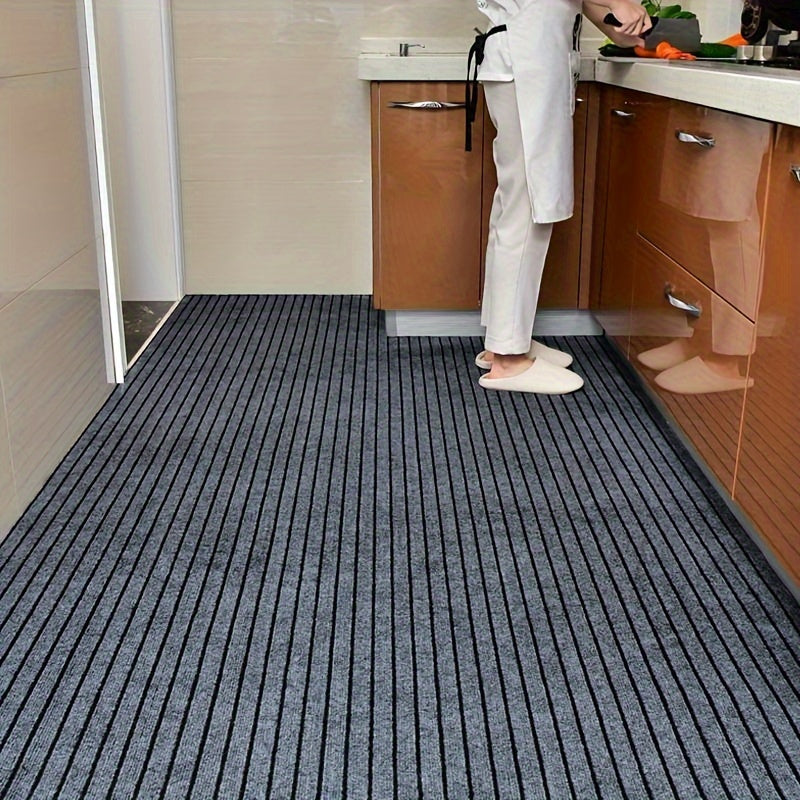 1 piece of a striped door mat that is water-absorbing and can be used as a bath pad. It is also anti-skid, oil-proof, and waterproof. This living room rug is washable and suitable for use in the living room, bedroom, bathroom, or as home decor. It can be