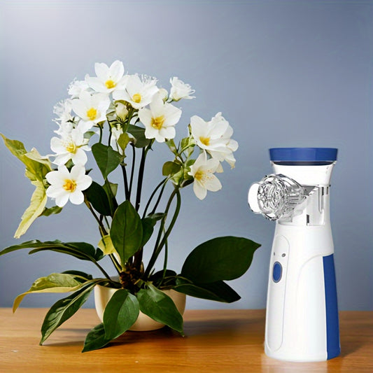 Small hand-held humidifier for facial hydration, ideal for gifting during holidays.