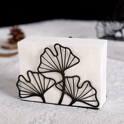 Stylish metal napkin holder with ginkgo leaf design, ideal for dining tables and kitchen decor in restaurants, hotels, and cafes.