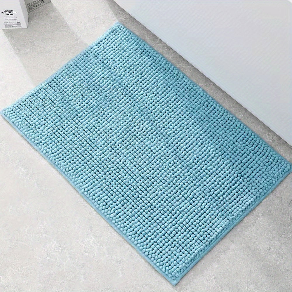 Get this luxurious Chenille Bath Mat, 2cm Thick, with a non-slip, super absorbent, quick-dry design. Made of woven polyester with rubber backing, this mat weighs 1450gsm and is perfect for the bathroom, kitchen, bedroom, or entryway. It also makes a