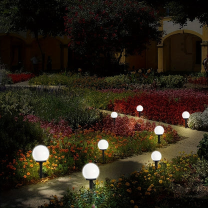 Solar-powered LED garden lights for outdoor landscapes - Durable plastic, automatic on/off, modern design for pathways, yards, decks, lawns, and patios.