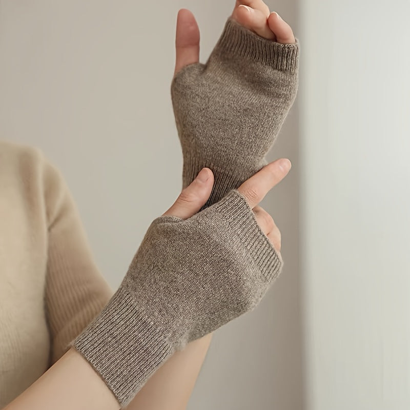 Stay warm in style with these luxurious 100% cashmere women's mittens. Hand-knitted for ultimate comfort and warmth, these gloves are elastic and hand washable for easy care. Perfect for a cozy weekend casual look.