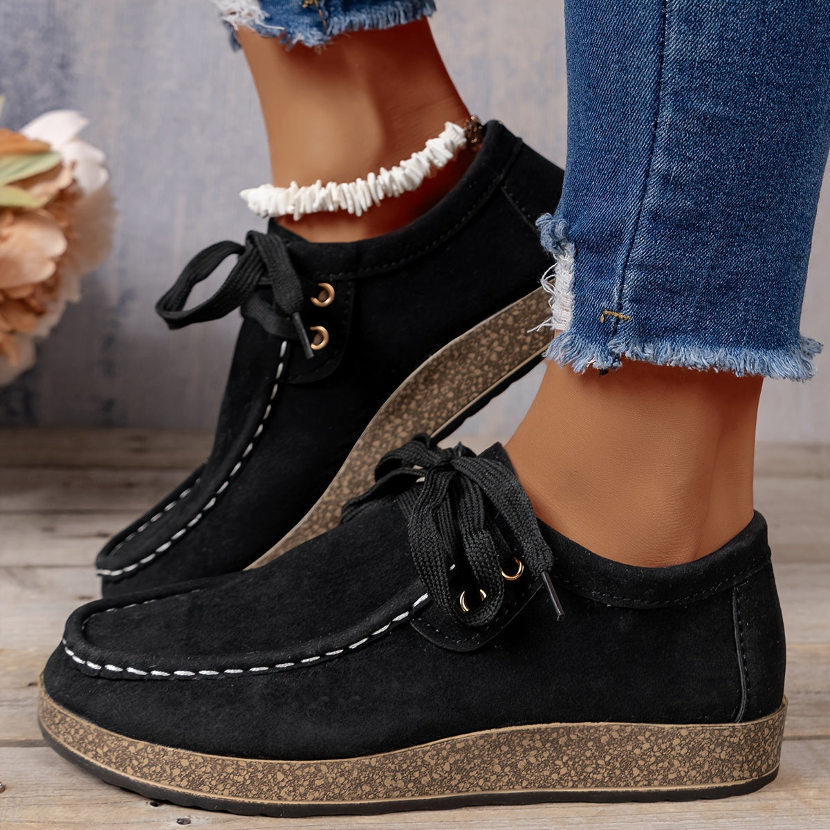 Women's casual sneakers with lace-up design and soft platform sole, a versatile low-top style available in plus size.