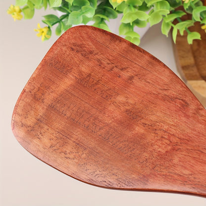 Eco-friendly wooden rice paddle and serving spoon for easy, healthy cooking.