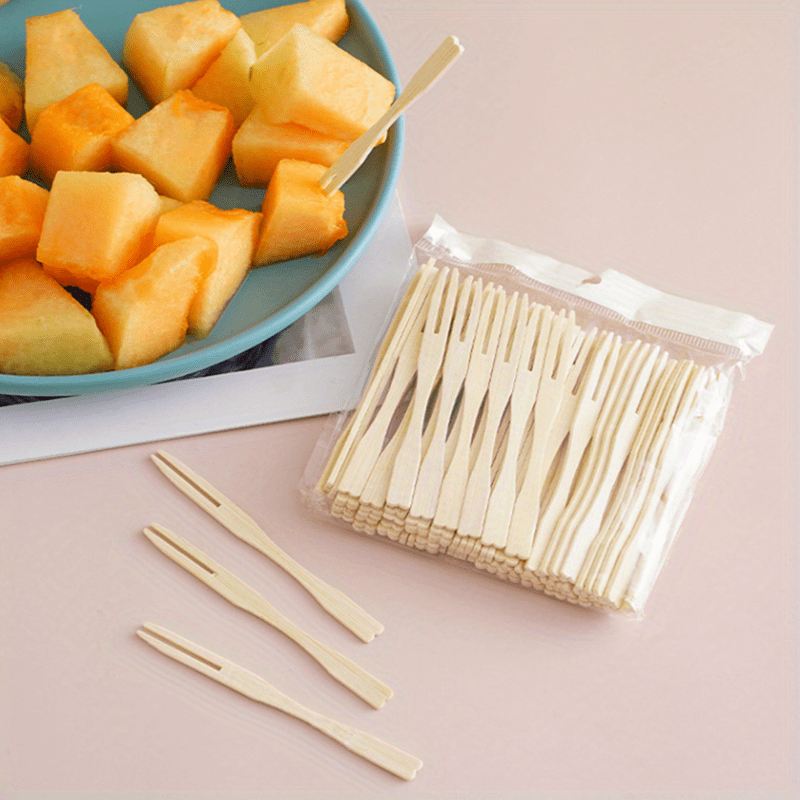 100 bamboo fruit forks ideal for weddings, birthdays, and parties, great for desserts, cocktails, and home decor.