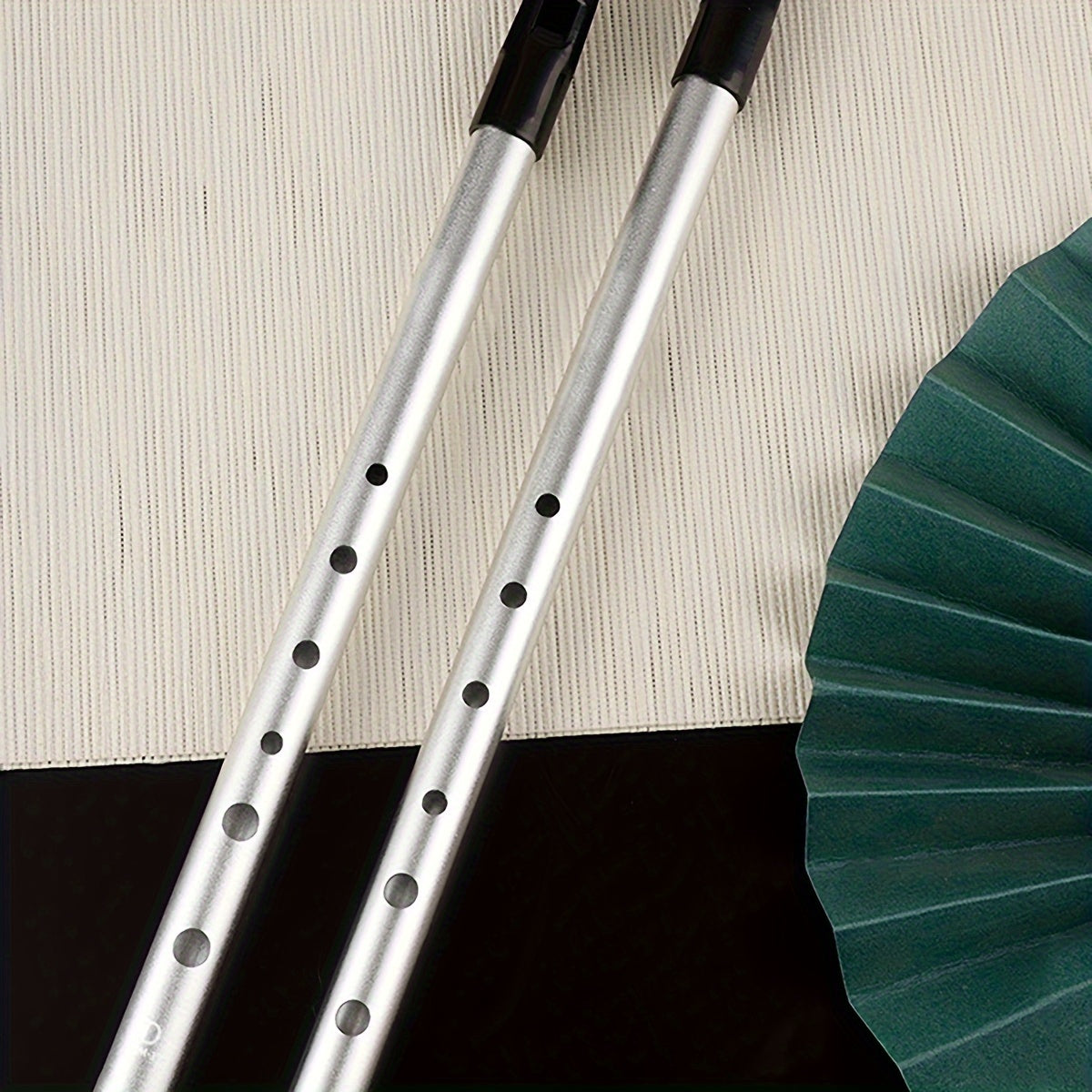 Adults learning to play the C or D tune on a professional straight flute with six holes made of golden aluminum alloy.