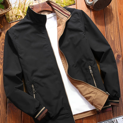 Reversible windproof jacket for men with military-inspired design, zip-up front, pockets, and long sleeves.