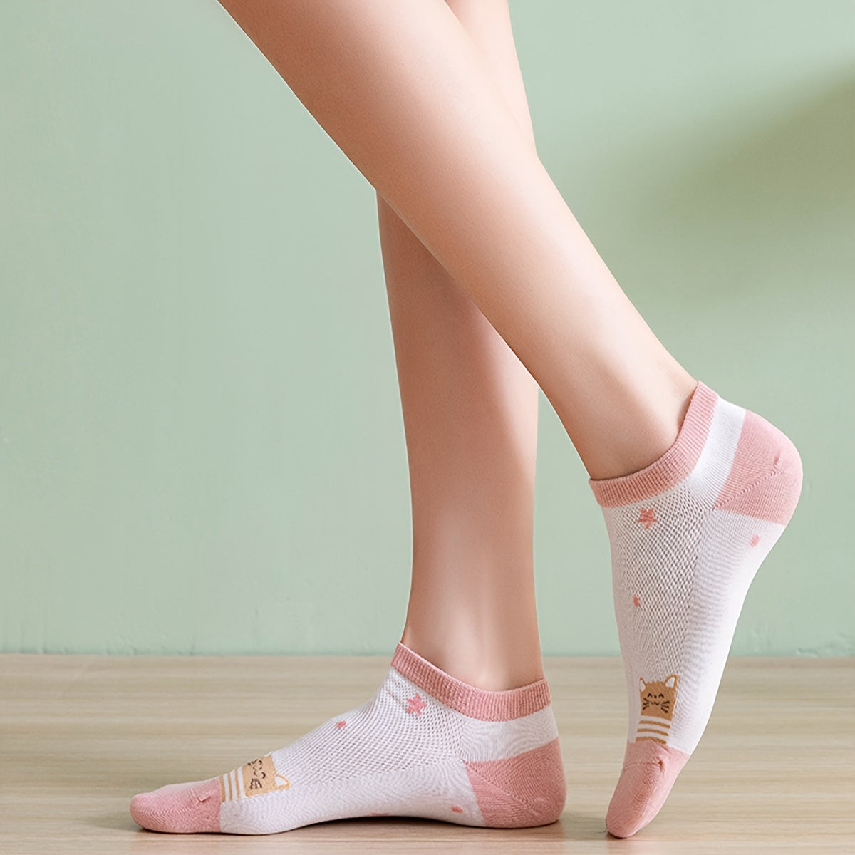 10 pairs of cute, comfy, and breathable cat pattern sports socks for women.