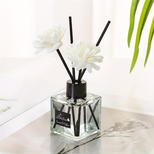 Elegant white floral diffuser with black sticks, versatile air freshener for bathroom, bedroom, car, and outdoor use. 1L capacity, glass container, indoor aesthetic.