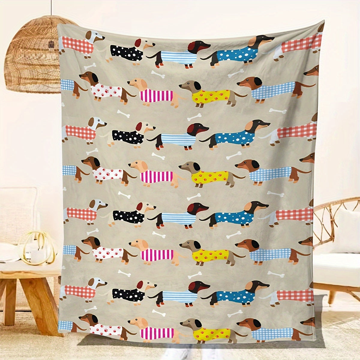 Stay cozy and comfortable with this stylish Dachshund Pattern Throw Blanket. Perfect for all seasons, this contemporary knitted polyester throw is stain-resistant and multipurpose. Featuring a digital print, it makes an ideal gift for dog lovers. Enjoy a