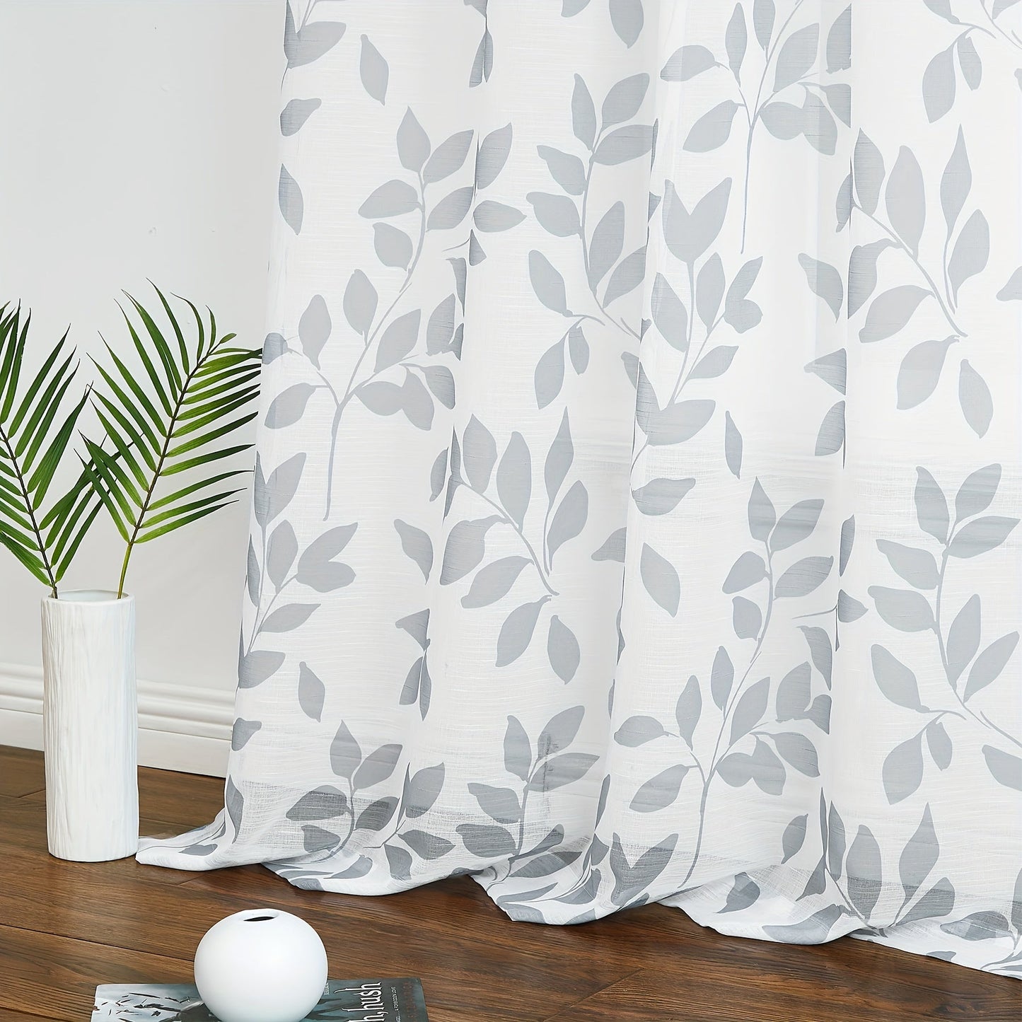 Decorate your bedroom, office, kitchen, living room, or study with these two leaf printed linen white sheer curtains. These rod pocket window treatments are the perfect addition to your home decor.