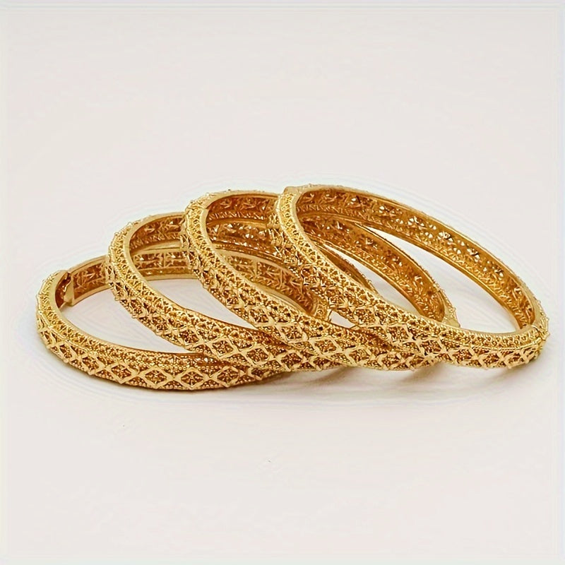 A set of four 24K golden plated bangle bracelets, luxurious and alluring zinc alloy jewelry inspired by Middle Eastern and African styles. Perfect for women to wear daily or to parties, music festivals, or as Ramadan gifts. Suitable for all seasons.